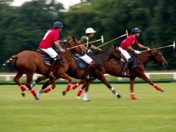 This photo of polo players and a polo game in progress was taken by Marcin Dabrowski of Wroclaw, Poland.